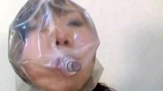Breathplay blowjob with plastic